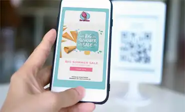 Customer scans QR Code and a Digital Coupon automatically opens on the smartphone.